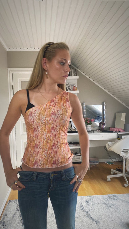 Ina one shoulder